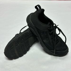 Black under Armour sneakers, youth size 4.5
